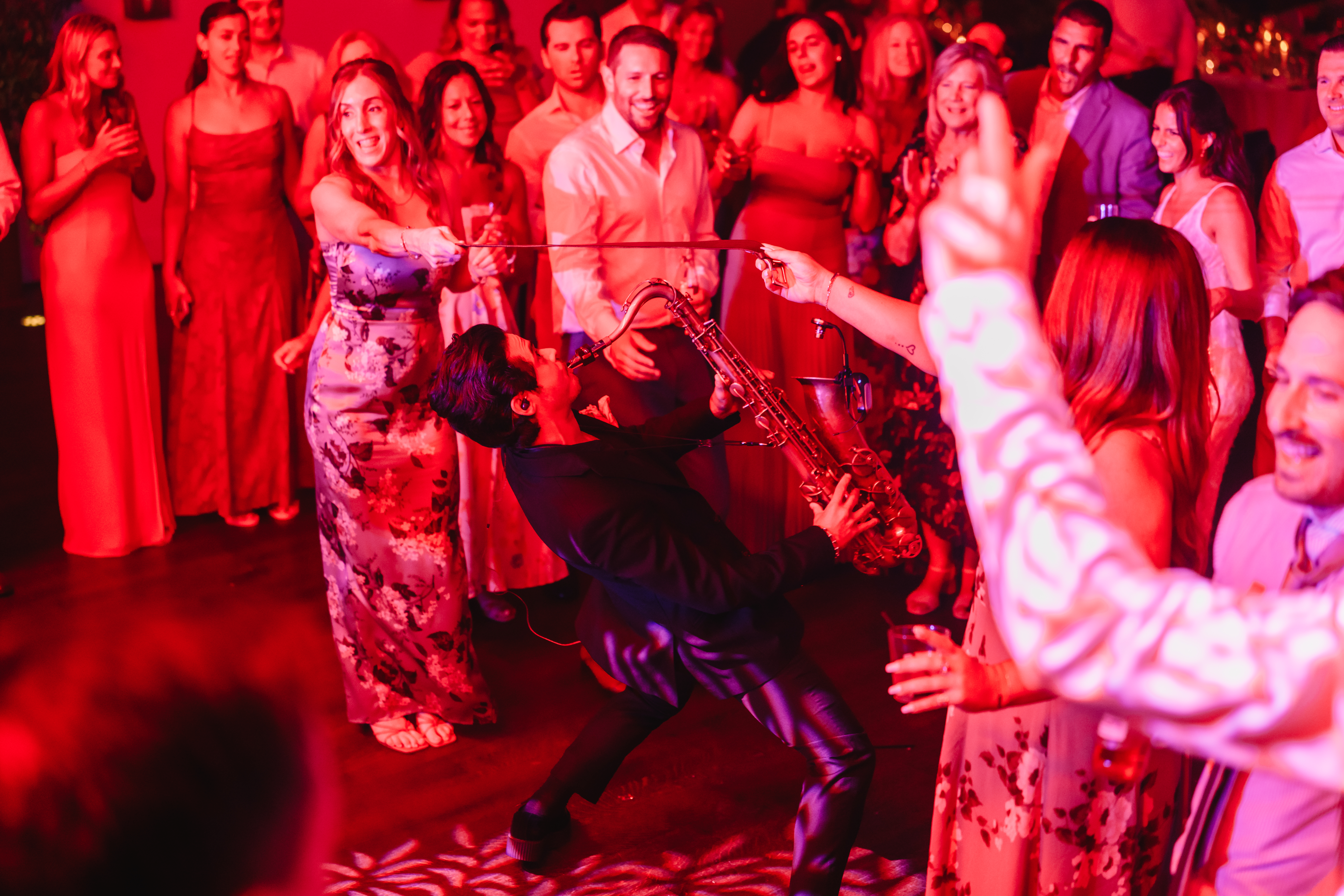 Steve Mode performing live saxophone at an event